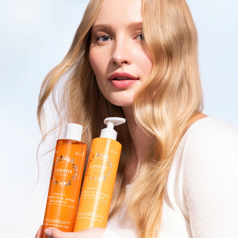 Woman holding Lumene products